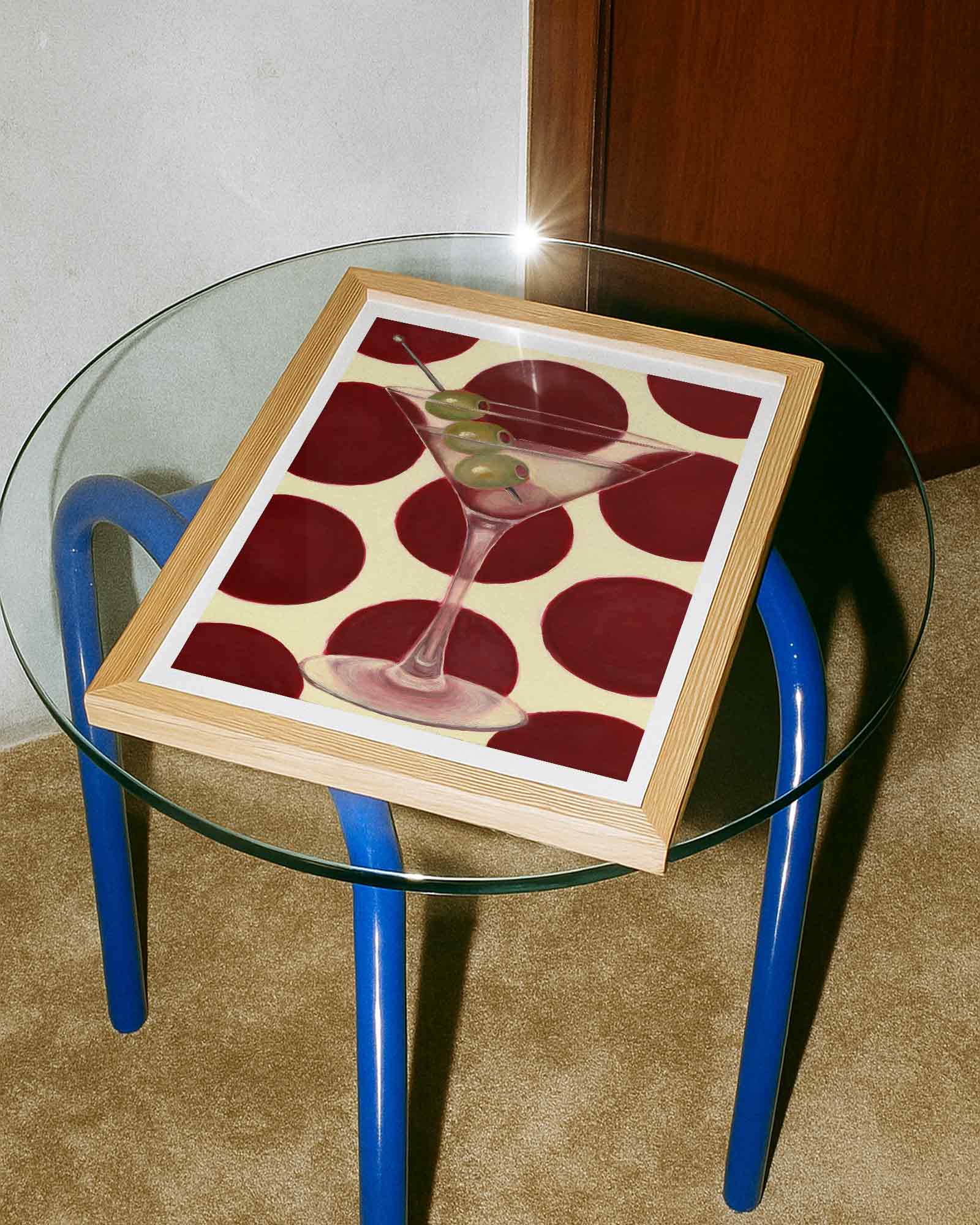 Glass table with a wooden frame featuring a cocktail design on a beige background