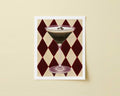 Print of a brown espresso cocktail with a diamond checkered background