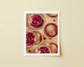 Print of red wine glasses on a beige background