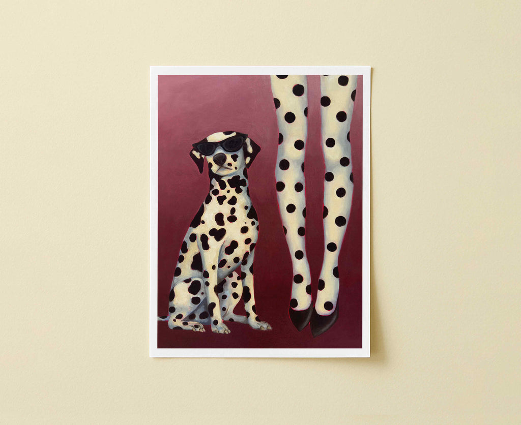 Print of a Dalmatian dog with sunglasses and woman with polka dot tights on a red background